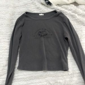 a grey long sleeve crop top from garage